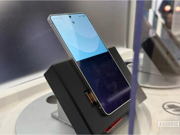 A Samsung Galaxy phone with a newer version of the Privacy Display, blocking out half of the screen.