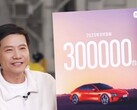Xiaomi's CEO with the SU7's new target. (Image source: Xiaomi)
