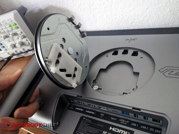 The stand is now simply hooked into the VESA mount