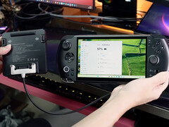 The external battery extension cable for Win 5 appears to be in an early stage now. Pictured: the accessory connected to the gaming handheld. (Image source: GPD)