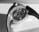 Sam Altman's custom watches feature OpenAI branding and an AGI-themed inscription on the back