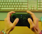 The Steam Controller will reportedly launch on May 4, 2026. Pictured: a promo shot of the controller being held.