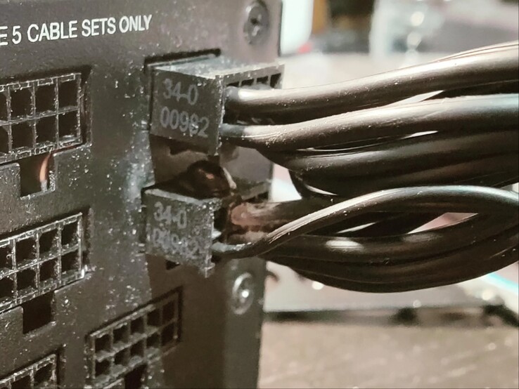 Power cable on the PSU end shows signs of burning and the connector has a visible bulge. (Image source: Roachard on Reddit)