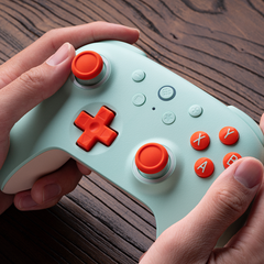 The Ultimate 2C offers a 1,000 Hz polling rate in wired and 2.4 GHz modes. (Image source: 8BitDo)