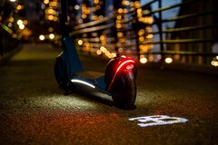 Bugatti's electric scooter features an LED light which projects the brand's logo on the ground when riding it (Image: Bugatti)