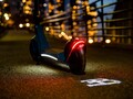 Bugatti's electric scooter features an LED light which projects the brand's logo on the ground when riding it (Image: Bugatti)