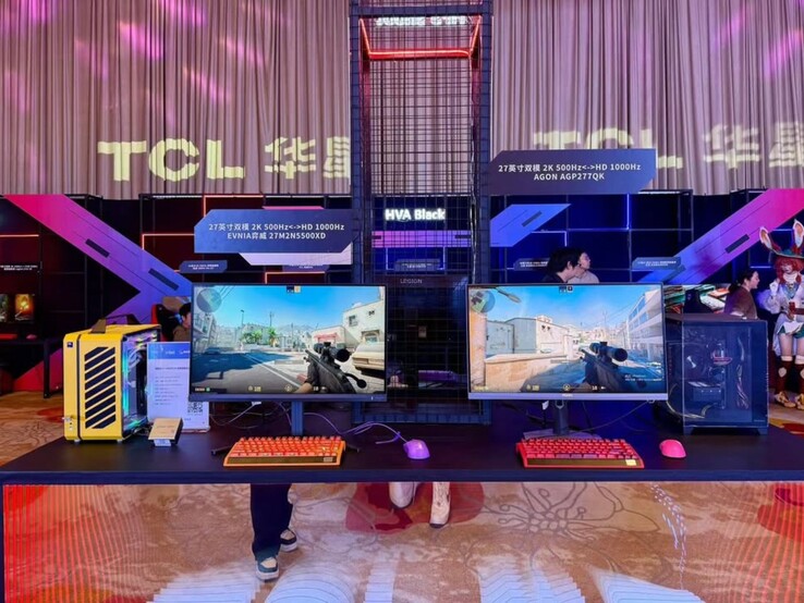 The Philips Evnia 27M2N5500XD and AOC Agon AGP277QK on display. (Image source: Philips)