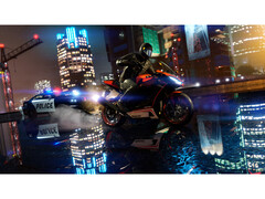 A screenshot taken from GTA V Enhanced that shows off the newly added ray tracing. A bike rides through a slick street at night, with a cop car closely behind. (Image Source: Steam)