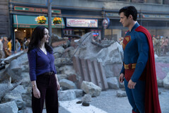 Lois Lane and Superman pause amid Metropolis rubble (Image source: Warner Bros. Pictures / Jessica Miglio via Batman News)