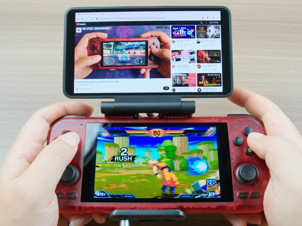 A still from a video showing the Dual Screen Add-on in use with a Retroid Pocket 4 Pro. (Image source: Retroid)
