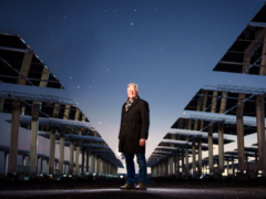 Pictured: Scientist John Sandusky amid heliostats at the National Solar Thermal Test Facility, New Mexico. (Image source: Craig Fritz)