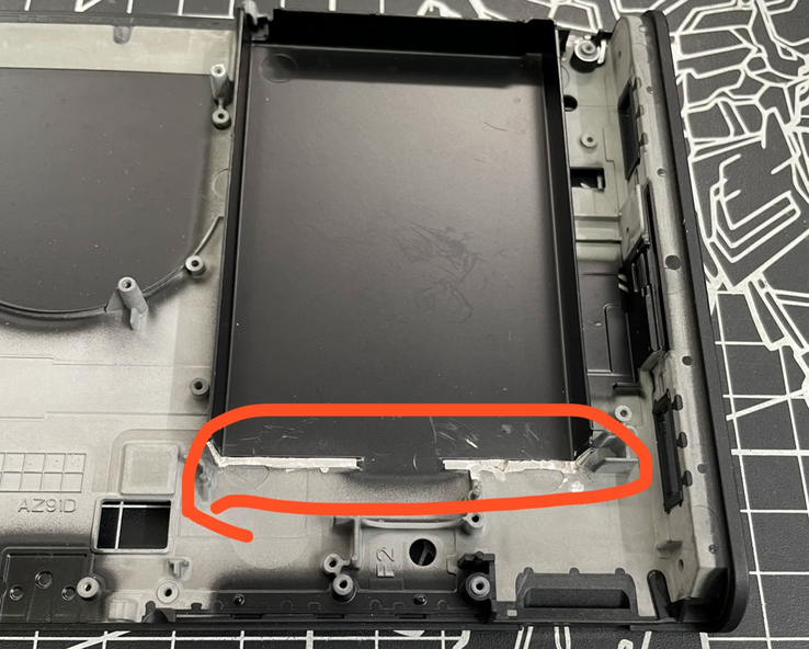 The area of the part that needs to be cut on a Switch 2 to fit the new battery