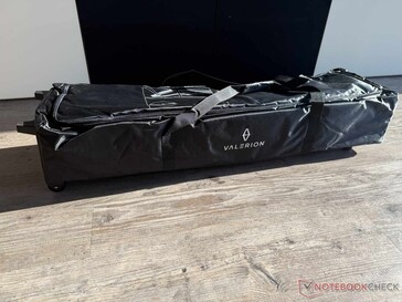 The outdoor screen comes packaged in a bag with transport wheels.