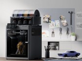 A promotional photograph of the Bambu Lab X2D 3D printer 
