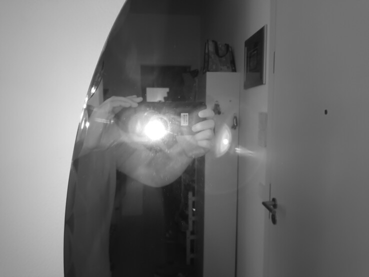 In the mirror you can see that the infrared light acts like a flash for night vision.