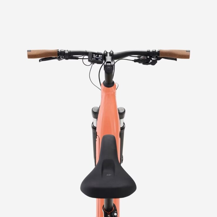 The Decathlon Peach Orange Rockrider E-ACTV 500 e-bike