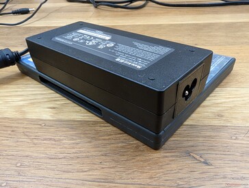 120 W power brick is relatively large at 14.5 x 6.4 x 3 cm