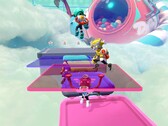 Popucom screenshot with characters on platforms in clouds solving puzzles