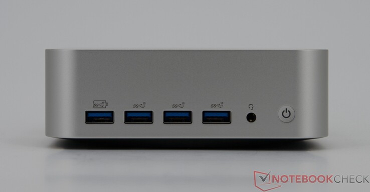 The Geekom A7 Max mini PC features four USB ports and an audio jack at the front. 