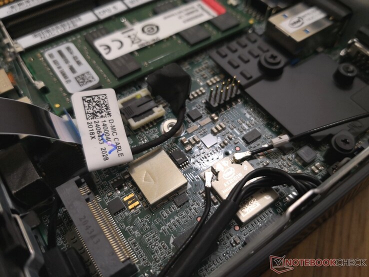 Non-removable Intel AX201 module sits underneath the M.2 drive