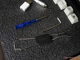 Keychron packs in a screw driver, Allen key, and keycap and switch puller. 
