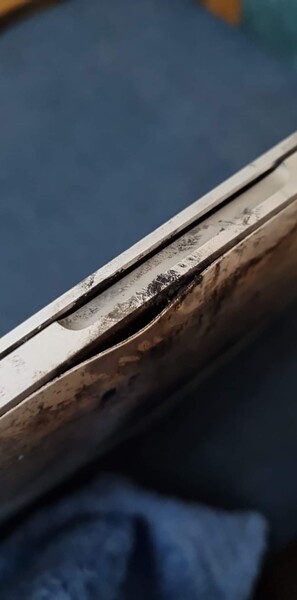 Fire-damaged 15-inch MacBook Pro. (Image source: U/Squeezieful)