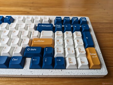 NumPad and arrow keys are squished closer together when compared to full-size keyboards
