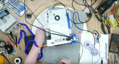 Ben Heck repairing the Super NES CD-ROM prototype. (Image: YouTube, The Ben Heck Show)