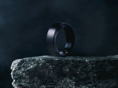 The Soxai Ring 2, pictured in a matte black finish on the edge of a rock against a dark background. (Image source: Soxai)