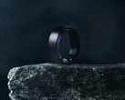 The Soxai Ring 2, pictured in a matte black finish on the edge of a rock against a dark background. (Image source: Soxai)