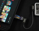 Nintendo Switch 2 drawing power from an external IceMag battery, connected via a Genki USB-C cable and inline power meter (Image source: ETA Prime on YouTube)