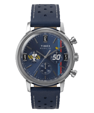 Close-up of the watch dial showing Snoopy and Woodstock, three chronograph subdials, a tachymeter scale, and vertical racing stripes.