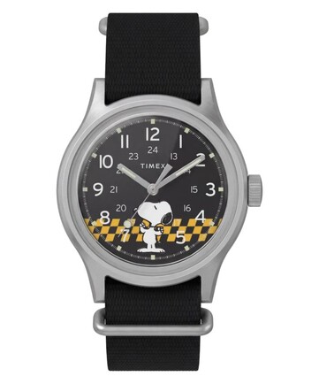 Front view of the Peanuts x Timex MK1 showing its black dial, Arabic numerals, luminous hands and markers, and checkered Snoopy graphic.