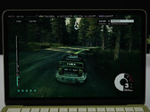 Virtualized Windows 11 gaming on the MacBook Neo with 8 GB of RAM is quite impressive. Pictured: Dirt 3 running on the laptop.