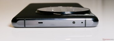 Top: Speaker vent, IR blaster, Microphone