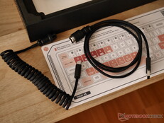 A premium coiled USB-C-to-A aviator cable. 
