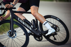 The Canyon Endurace:ONfly e-bike (pictured) has a slim handlebar-mounted remote that switches modes and displays assist status. (Image source: Canyon)