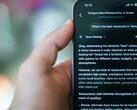 Someone using their phone to find a restaurant using Gemini