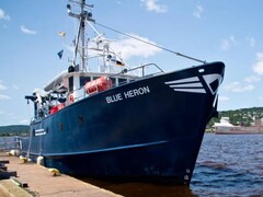 A photograph showing the Blue Heron boat. (Image source: University of Minnesota Duluth)