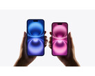 A promotional image for the iPhone 16 that show two pairs of hands holding two different color variants on a grey background. (Image Source: Apple)