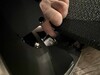 Cable connection between the backrest and seat