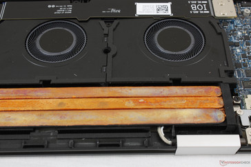 Triple heat pipes with graphite heat spreaders