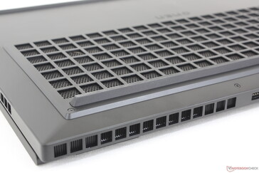 Square ventilation grilles contrast the hexagonal grilles of the Alienware design