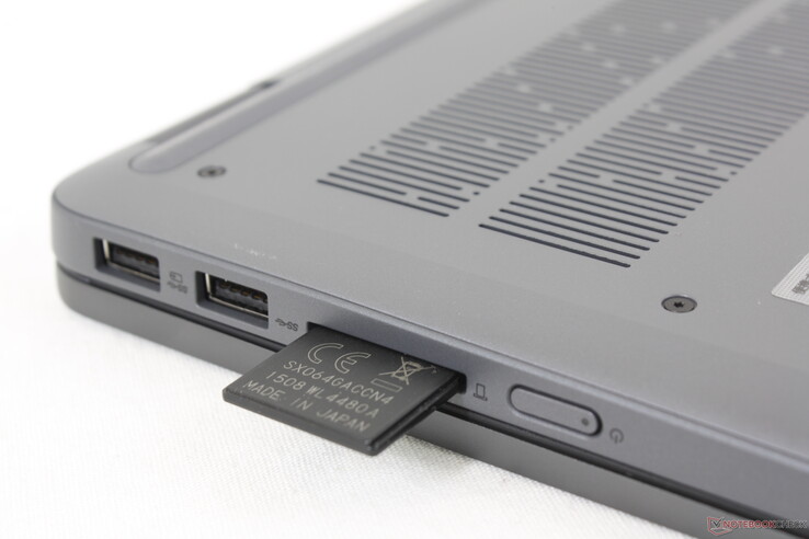 Fully inserted SD card protrudes by over half its length for unsafe transporting. The integrated card reader is not spring-loaded unlike on most other laptops