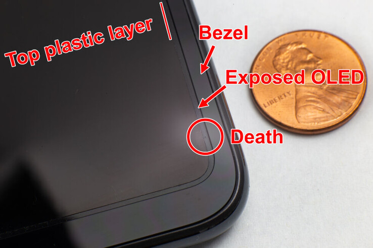 A small puncture can be seen in the exposed part of the OLED panel. (Source: Ars Technica)