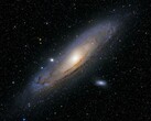An image showing the Andromeda Galaxy and its satellite galaxies.