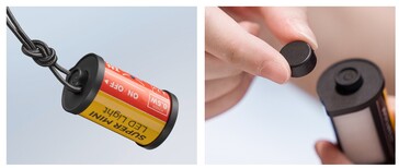 The power button is protected by a removable cap and has a strap hole for easy carry. (Image source: Shoten Kobo)