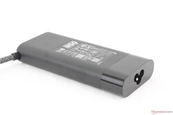 Universal 100 W USB-C AC adapter (~13.5 x 6 x 2.3 cm)