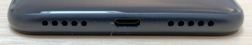 Bottom: microphone, micro-USB port, speakers