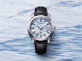 Citizen AQ4090-08A displayed on an indigo washi paper background, emphasizing the handcrafted dial's blue mist-like pattern.
